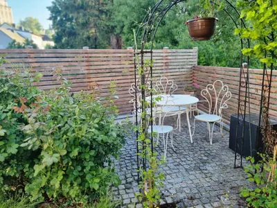 Ein Garten an der Unterkunft Newworkcenter Apartmenthaus