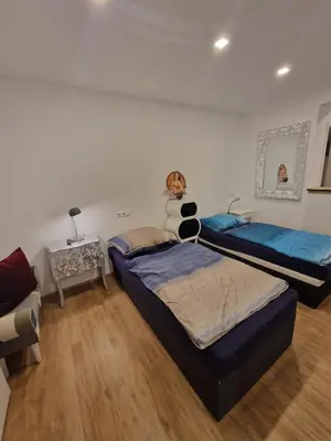 Ein Bett oder Betten in einem Zimmer der Unterkunft Newworkcenter Apartmenthaus