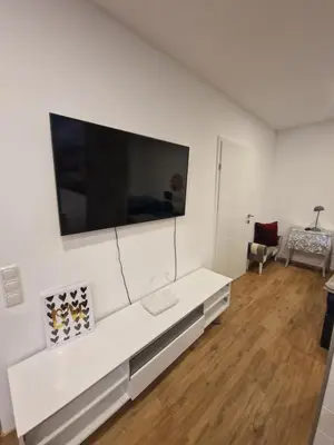 TV/Unterhaltungsangebot in der Unterkunft Newworkcenter Apartmenthaus