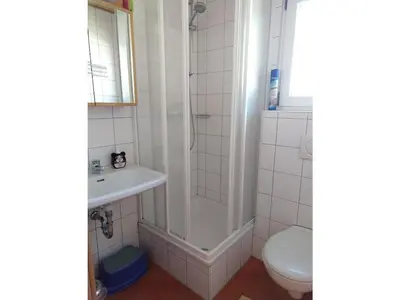 Ein Badezimmer in der Unterkunft Chalet Alpendorf Dachstein West 15