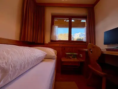 Ein Bett oder Betten in einem Zimmer der Unterkunft Ferienwohnung Fink, Appartement Haus Martin