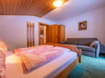 Ein Bett oder Betten in einem Zimmer der Unterkunft Ingrid II