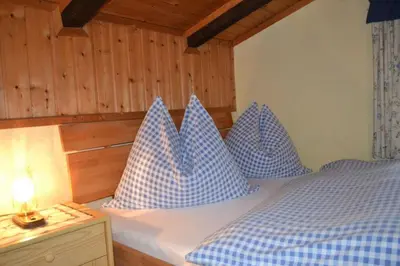 Ein Bett oder Betten in einem Zimmer der Unterkunft Ferienhaus Kammerer