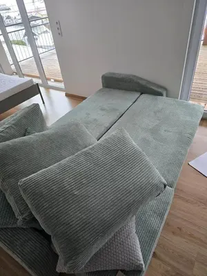 Ein Bett oder Betten in einem Zimmer der Unterkunft Naturnah & gemütlich - Feriennest mit Bergkulisse
