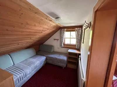 Ein Bett oder Betten in einem Zimmer der Unterkunft Blashof seit 1693 - Apartments Schladming
