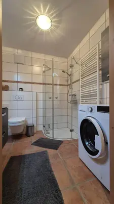 Ein Badezimmer in der Unterkunft Ferienwohnung beim Schnellerbauer