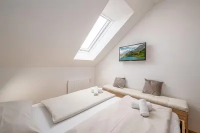 Ein Bett oder Betten in einem Zimmer der Unterkunft Apartment Martina Peaks & Sun - by myNests