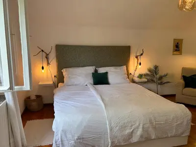 Ein Bett oder Betten in einem Zimmer der Unterkunft House Flora - at Lake Traunsee