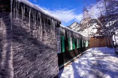 Privates Alpenchalet mit Außensauna im Winter