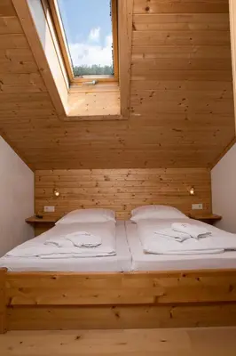 Ein Bett oder Betten in einem Zimmer der Unterkunft Glonerbauer Apartment