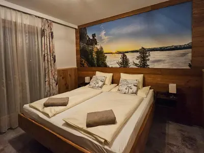 Ein Bett oder Betten in einem Zimmer der Unterkunft Berghof Mitterberg