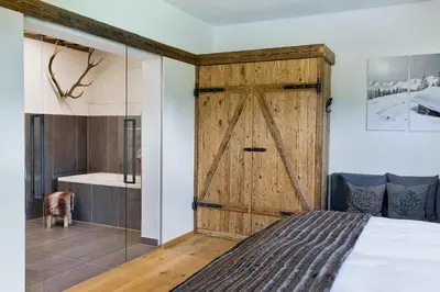Ein Bett oder Betten in einem Zimmer der Unterkunft Das Chalet