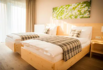 Ein Bett oder Betten in einem Zimmer der Unterkunft Gasthof Wachter