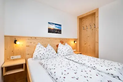 Ein Bett oder Betten in einem Zimmer der Unterkunft Ausserraingut