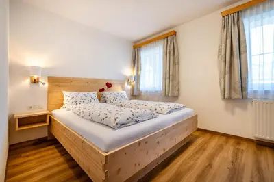 Ein Bett oder Betten in einem Zimmer der Unterkunft Ausserraingut