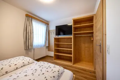Ein Bett oder Betten in einem Zimmer der Unterkunft Ausserraingut