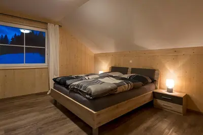 Ein Bett oder Betten in einem Zimmer der Unterkunft Haus Loserblick