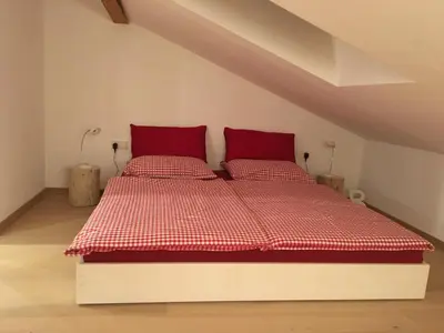 Ein Bett oder Betten in einem Zimmer der Unterkunft Appartement Aich-Assach