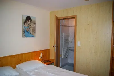 Ein Bett oder Betten in einem Zimmer der Unterkunft Abenteuerhof