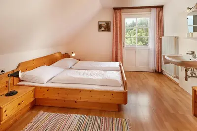 Ein Bett oder Betten in einem Zimmer der Unterkunft Abenteuerhof