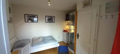 Ein Bett oder Betten in einem Zimmer der Unterkunft Topwohnung 45m2 oder weißes Budget Zimmer 15 m2 - Nähe Grünberg