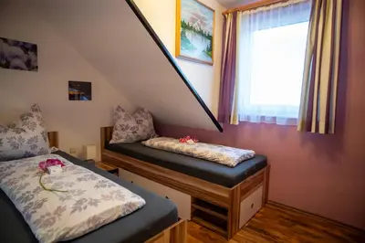 Ein Bett oder Betten in einem Zimmer der Unterkunft Appartement Edelweiss mit Infrarotkabine