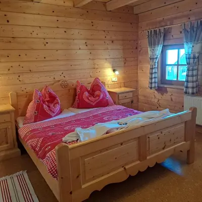 Ein Bett oder Betten in einem Zimmer der Unterkunft Ferienwohnung Familie Sigl - Rotlechner