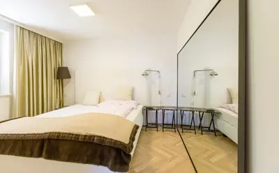 Ein Bett oder Betten in einem Zimmer der Unterkunft Apartments Villa Traunseeblick