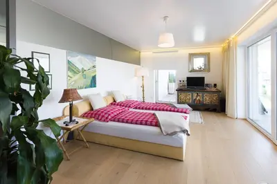 Ein Bett oder Betten in einem Zimmer der Unterkunft Apartments Villa Traunseeblick
