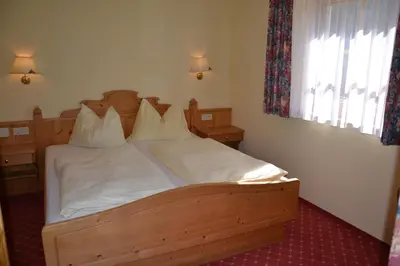 Ein Bett oder Betten in einem Zimmer der Unterkunft Holiday-Appartements