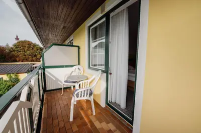 Ein Balkon oder eine Terrasse in der Unterkunft Gasthof Fruhstorfer