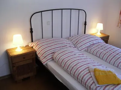 Ein Bett oder Betten in einem Zimmer der Unterkunft Ferienwohnung Gimplbauer