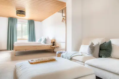 Ein Bett oder Betten in einem Zimmer der Unterkunft Höllhof Dachstein West