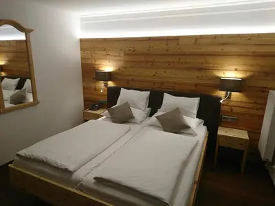 Ein Bett oder Betten in einem Zimmer der Unterkunft Hotel Binggl
