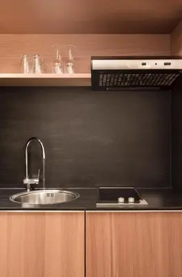 Küche/Küchenzeile in der Unterkunft Hotel Manggei Designhotel Obertauern