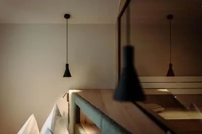 Ein Bett oder Betten in einem Zimmer der Unterkunft Alpina Alpendorf