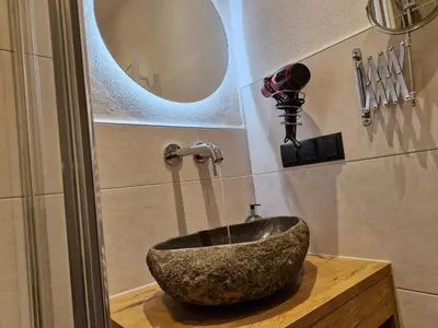 Ein Badezimmer in der Unterkunft Apartmenthaus Kristall