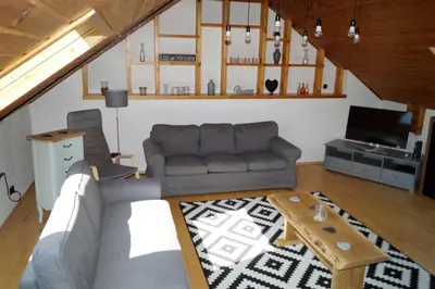 Ein Sitzbereich in der Unterkunft Apartment Lungau