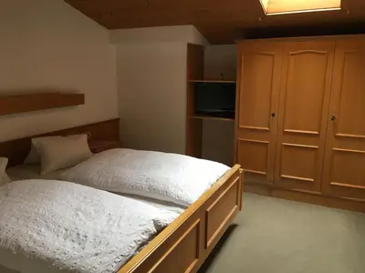 Ein Bett oder Betten in einem Zimmer der Unterkunft Hubergut Appartements