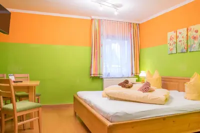 Ein Bett oder Betten in einem Zimmer der Unterkunft Hotel Gell