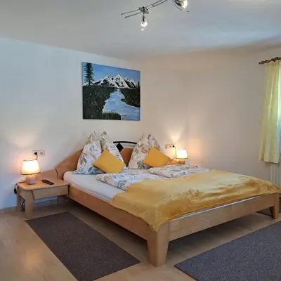 Ein Bett oder Betten in einem Zimmer der Unterkunft Reiters-Ferienhaus