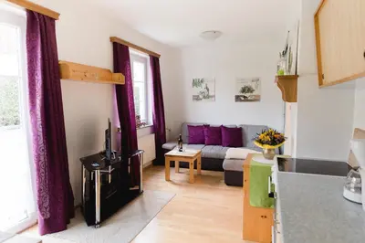 Ein Sitzbereich in der Unterkunft Wohnung am See