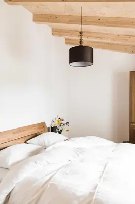 Ein Bett oder Betten in einem Zimmer der Unterkunft Gästehaus Erika - by myNests