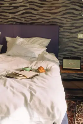 Ein Bett oder Betten in einem Zimmer der Unterkunft Cortisen am See - Adults only