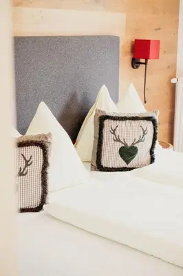 Ein Bett oder Betten in einem Zimmer der Unterkunft Hotel Aberseehof