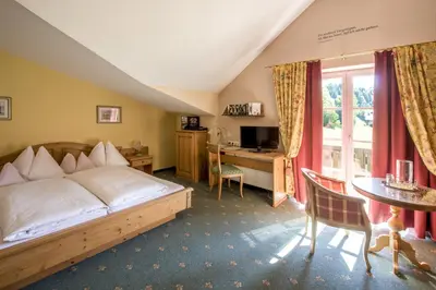 Ein Bett oder Betten in einem Zimmer der Unterkunft Garni Haus Sonnleitn - Adults only