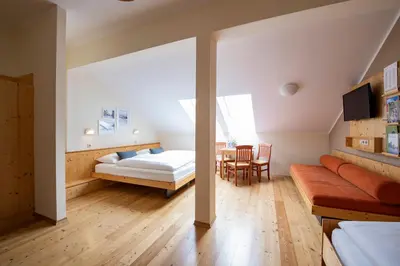 Ein Bett oder Betten in einem Zimmer der Unterkunft JUFA Hotel Murau