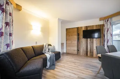 Ein Sitzbereich in der Unterkunft Knappensteig Appartements