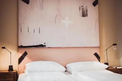 Ein Bett oder Betten in einem Zimmer der Unterkunft Strandhotel Margaretha