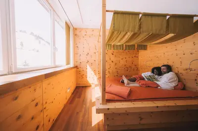 Ein Bett oder Betten in einem Zimmer der Unterkunft Hotel Enzian - Adults Only